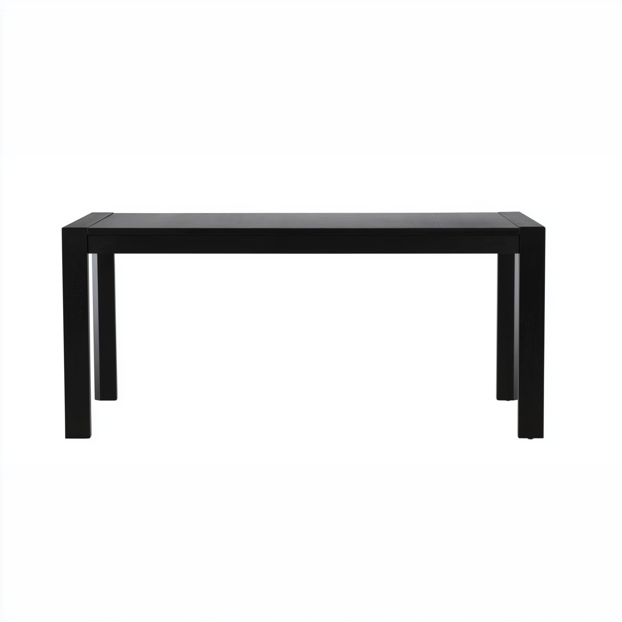 Table à manger en chêne teinté noir, vue de face sur fond neutre, plateau rectangulaire et pieds carrés, veinage visible
