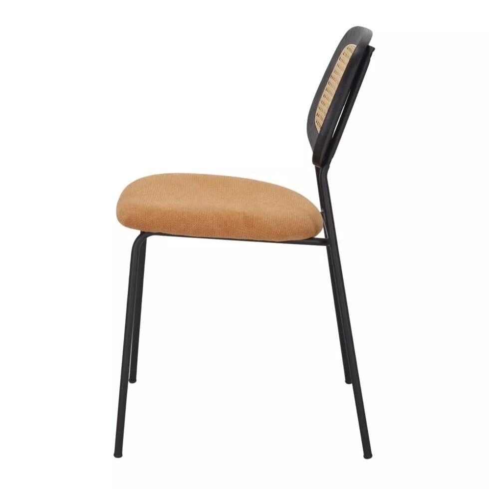 Chaise à assise curry et dossier cannage encadré bois noir, structure tubulaire acier noir, vue de profil, fond clair