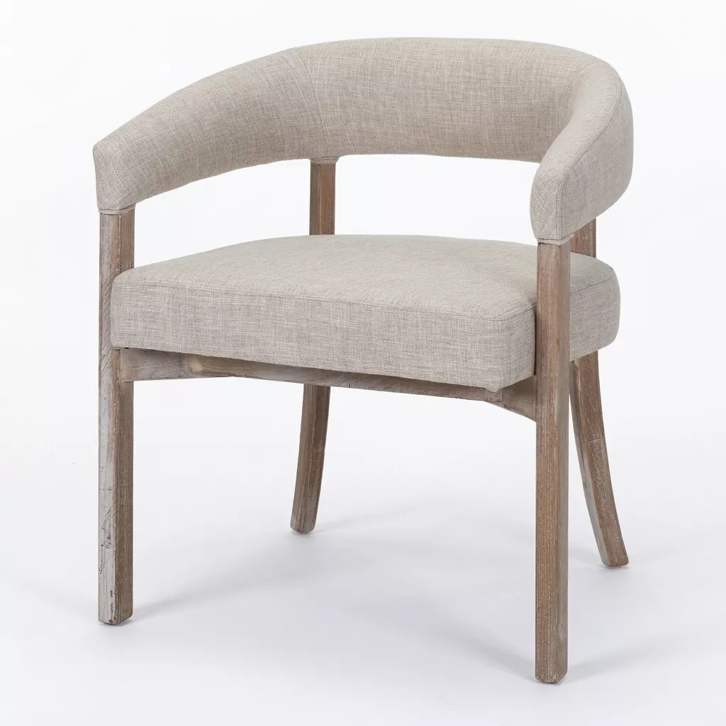 Chaise à dossier arrondi enveloppant en tissu chiné, accoudoirs intégrés et piétement en orme cérusé gris-beige, fond neutre