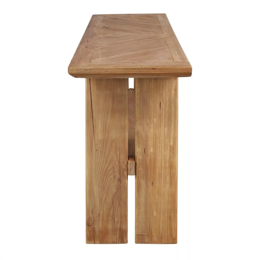 Console pin recyclé massif au plateau en épis, vue de profil fond neutre, traverse basse et pieds en cadre droit visibles.