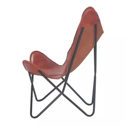 Fauteuil butterfly en cuir caramel, vue de profil, silhouette en X de la structure tubulaire acier noir mat